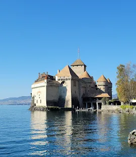 Romantic view of Chillon Castle, Swiss heritage explored with comforttransfer